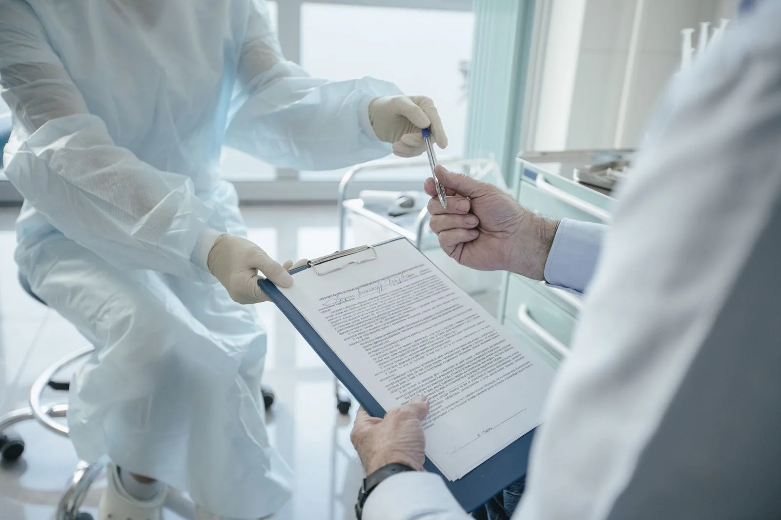 A clinician reviewing a written plan with a patient
